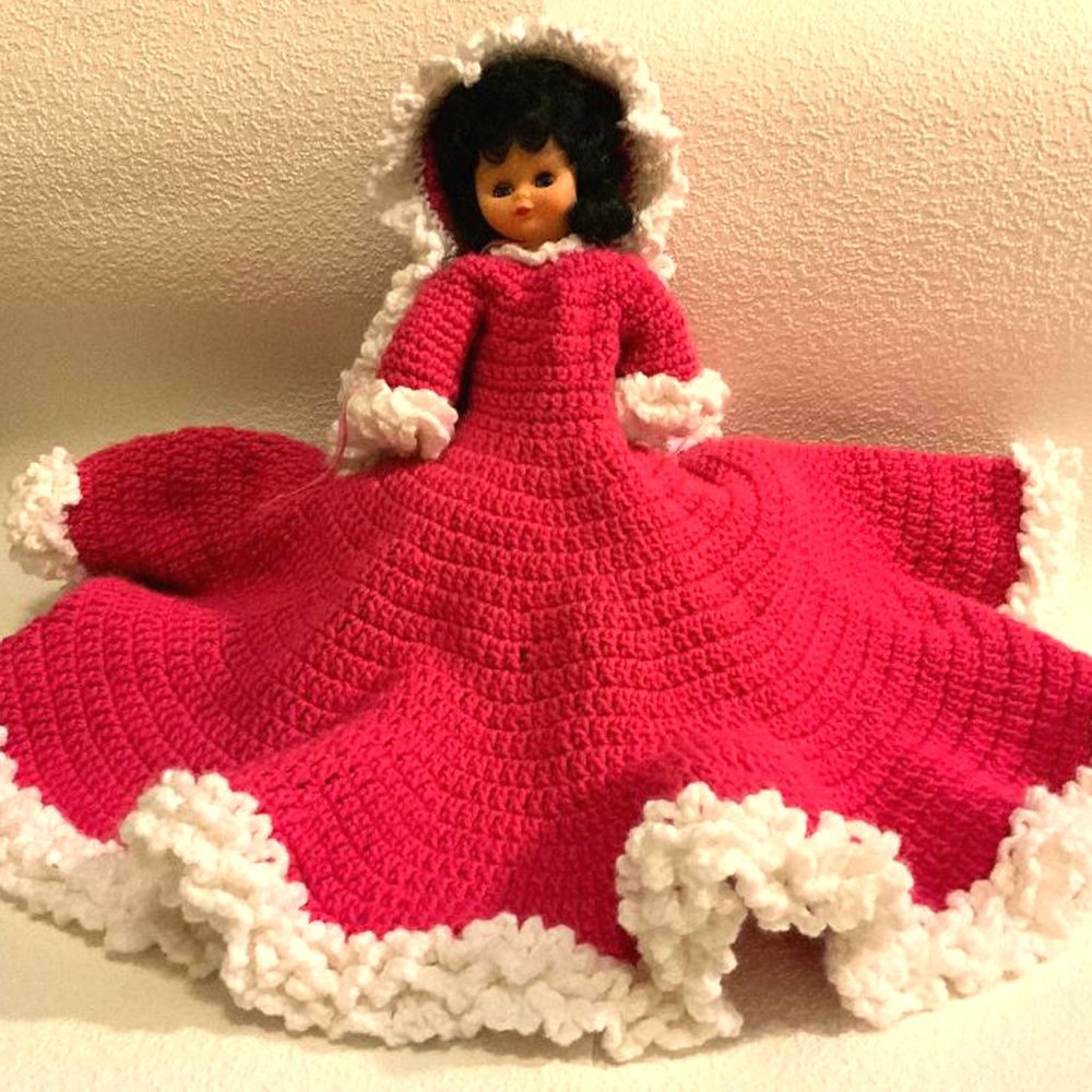 Bed Doll in a Bright Pink Crocheted Dress